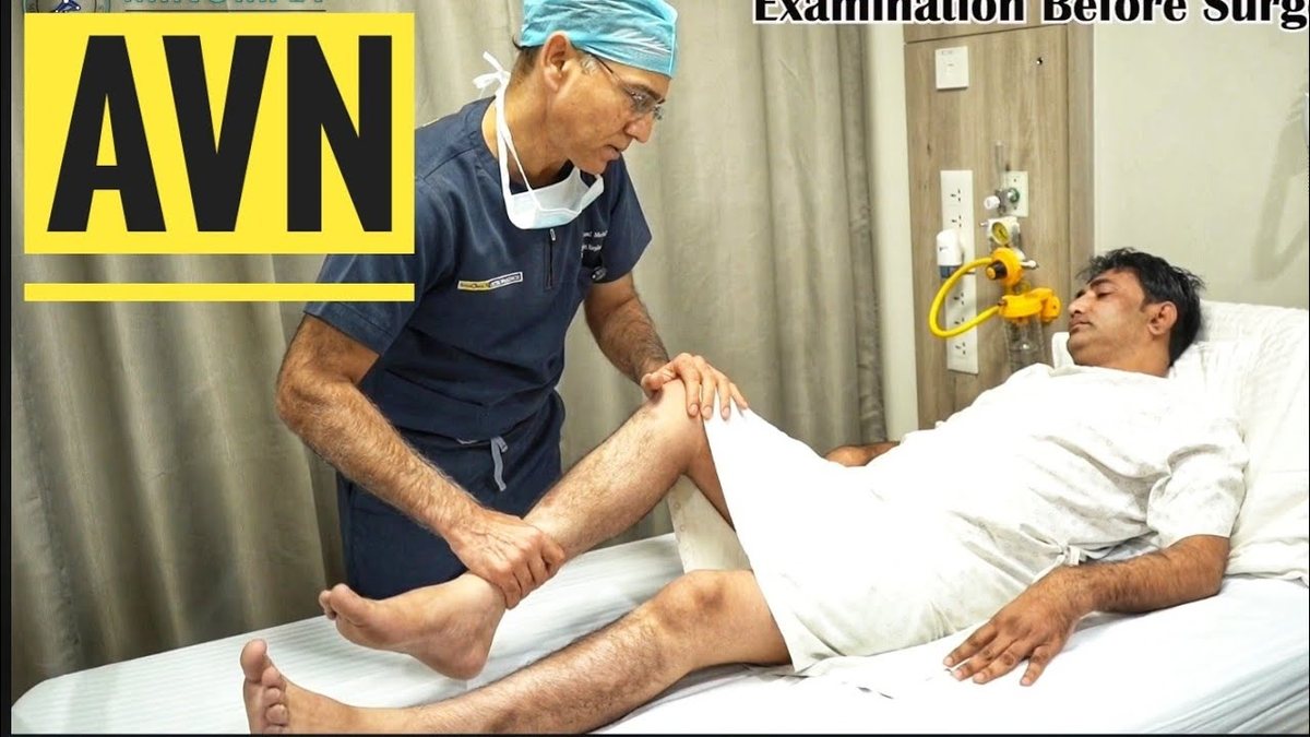 Dr. Ashwani Maichand examining a patient before AVN hip surgery